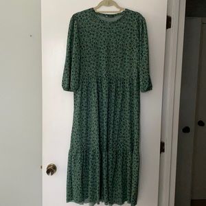 Zara midi length green & black dress with raw him. Size M